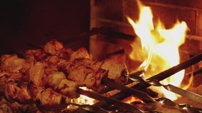 Traditional kebab on the grill with skewers in the turkish restaurant for dinner. Food culture. 4K UHD still video camera