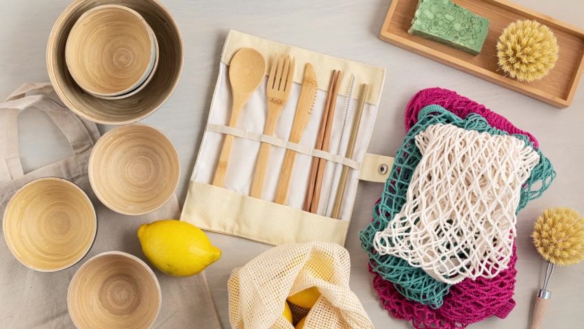 Stop motion animation of Zero waste kit. Set of eco friendly bamboo cutlery, mesh cotton bag, reusable coffee tumbler, brushes and water bottle. Sustainable, ethical, plastic free  | Shutterstock HD Video #1051641643