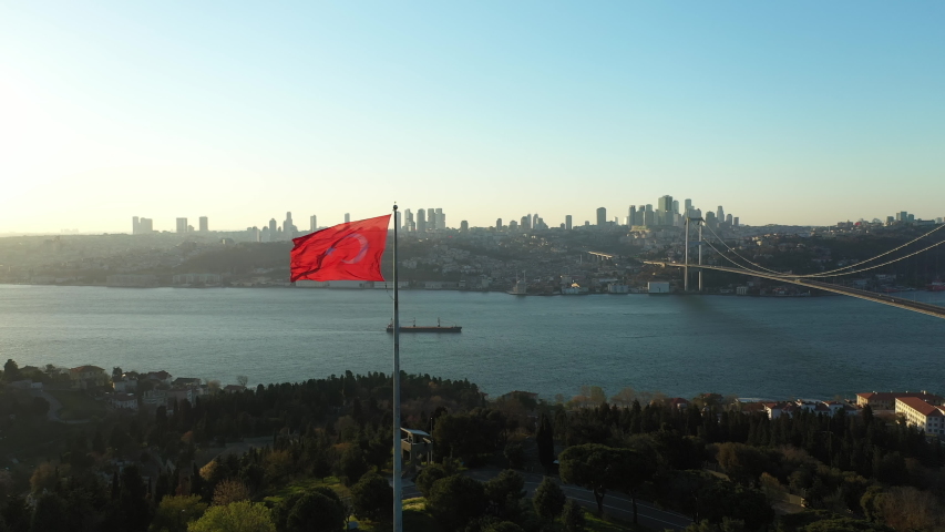 Aerial view of Empty Istanbul Bosphorus Bridge and Turkish Flag. No People. 15 July Martyrs Bridge without people. Quarantine days. 4K Footage in Turkey Royalty-Free Stock Footage #1051642918