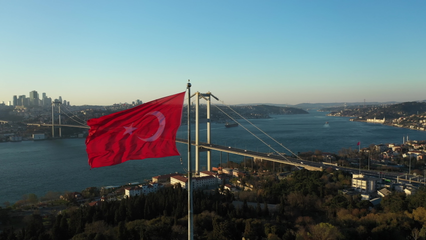Aerial view of Empty Istanbul Bosphorus Bridge and Turkish Flag. No People. 15 July Martyrs Bridge without people. Quarantine days. 4K Footage in Turkey Royalty-Free Stock Footage #1051642918