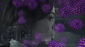 Animation of a mixed race woman over macro Covid-19 cells floating and a cityscape in the background. Global public health coronavirus Covid 19 pandemic concept digital composite. - Powered by Shutterstock - Get 15% off with code: PIKWIZARD15