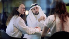 Corporate communication. Business company people. Businessmen communication. Modern office interior. Technology background. Business person. Seminar presentation. Saudi arabia. - Powered by Shutterstock - Get 15% off with code: PIKWIZARD15