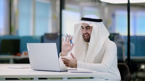 Arab businessman video call in arabic style. Business success concept. Communication online video call concept. Businessmen communication. Video chat.