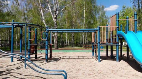Empty children playground during quarantine by reason of coronavirus covid-19 virus threat.