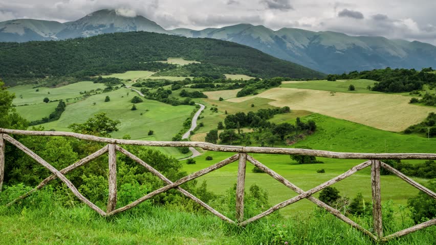Clouds and green mountains in Italy at spring