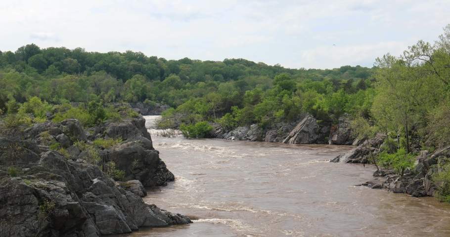 Great Falls is a series of rapids and waterfalls on the Potomac River, 14 miles upstream from Washington, D.C., on the border of Montgomery County, Maryland and Fairfax County, Virginia.