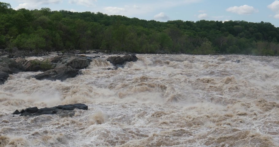 Great Falls is a series of rapids and waterfalls on the Potomac River, 14 miles upstream from Washington, D.C., on the border of Montgomery County, Maryland and Fairfax County, Virginia.