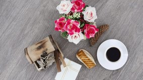 Cup of black coffee with sweets on table background.