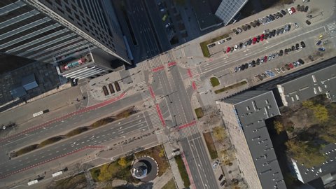 Vertical view of empty road intersection in Warsaw City Center, Emili Plater and Świetokrzyska street.  Shoted in 5.2K CDNG, Warszawa, Poland, Polska