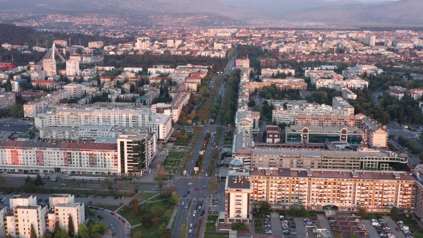 Podgorica, capital of Montenegro: circling above new and modern city blocks of commercial and residential buildings.