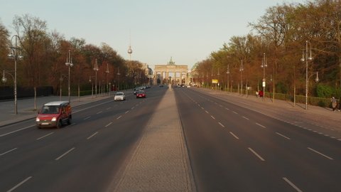 AERIAL: Flight towards Empty Brandenburger Tor in Berlin, Germany due to Corona Virus COVID19 Pandemic in Sunset Light