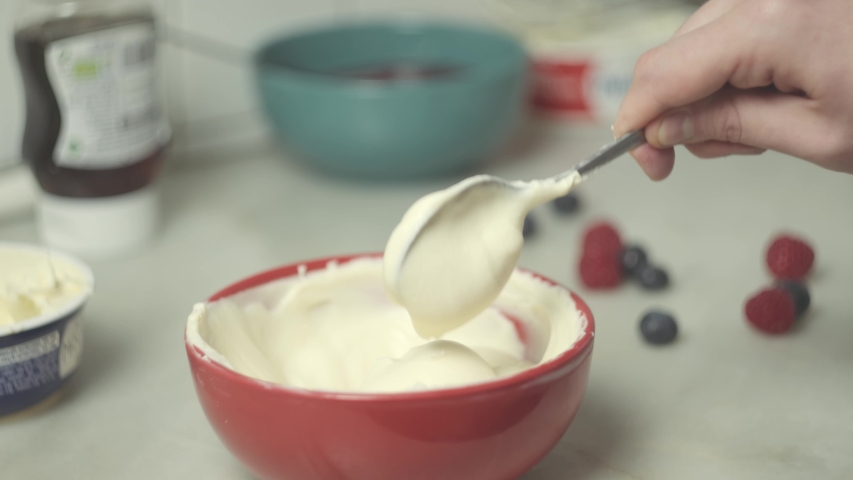 Slowly whipping cheese cream shot in 4k slowmotion | Shutterstock HD Video #1051748875