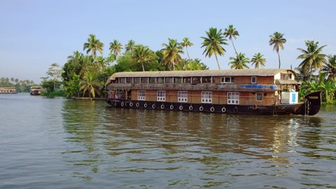 Traditional houseboat at beautiful backwaters in Alleppey, Kerala state, India