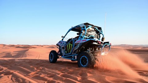 Riyadh, Saudi Arabia - January 24th 2020: All-terrain vehicle (SSV) in the action in the beautiful red sand desert in middle of Saudi Arabia near Riyadh city.