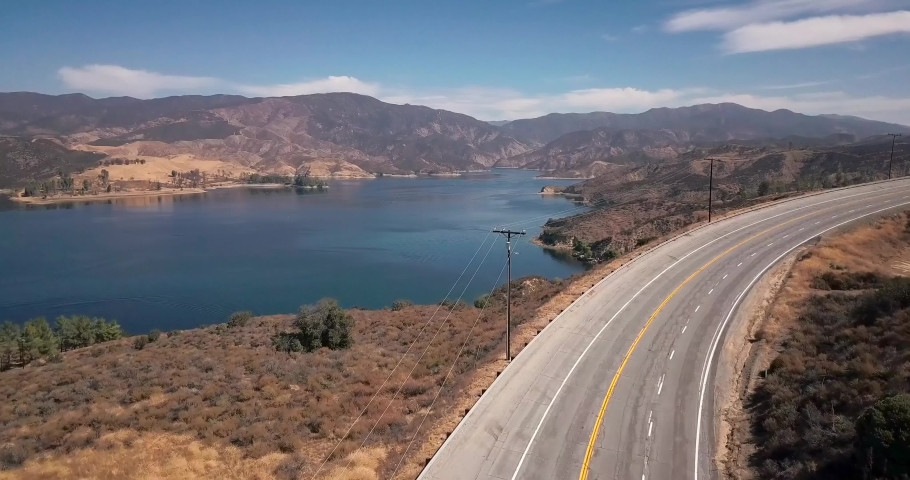 Castaic, California / USA - 10 07 2019 Cinematic Aerial Overview of Castaic Lake, California, Reservoir With Boating, Fishing Swimming Facilities. View From Freeway Road