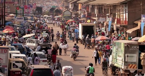 
Kampala, Uganda - February 13 , 2020 : Heavy traffic and people in the center of Kampala.Kampala is the capital city of Uganda in Africa.