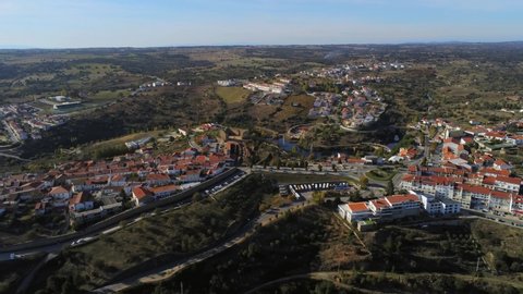 Aerial cinematic pan of Miranda Do Douro town in Portugal