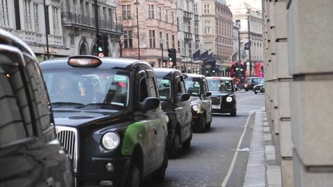 London, Greater London, United Kingdom / United Kingdom (UK) - 06 19 2018: London Taxis Picadilly