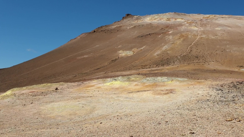 Hverir Myvatn geothermal area with boiling mudpools and steaming fumaroles in Iceland