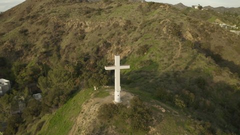 Flight around the Hollywood Cross, also know as the Hollywood Pilgrimage Memorial Monument with John Anson Ford Theatre, Hollywood Bowl, Hollywood and downtown Los Angeles in the background.