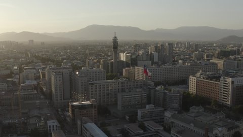 SANTIAGO, CHILE - June 25, 2019 Aerial view of the Palacio la Moneda in the historic center of Santiago de Chile and the Chilean flag flying