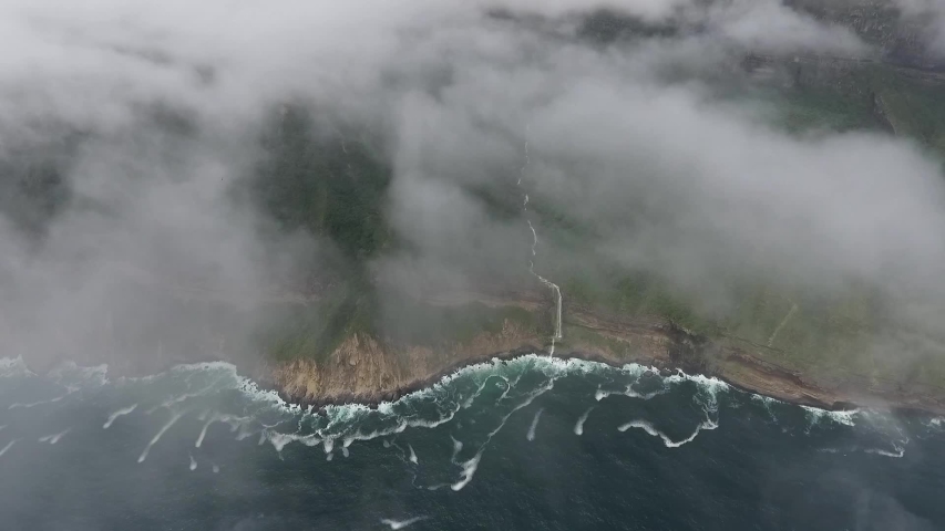 A surprising snapshot of the drone in the fall in Salalah, Ain Darbat, Sultanate of Oman	
