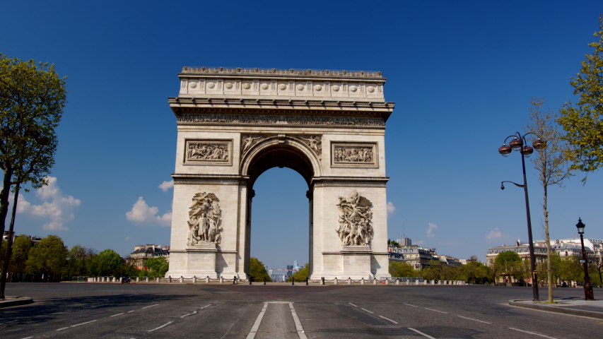 Covid-19: Arc de Triomphe streets are desolate with just few vehicles, quarantine Royalty-Free Stock Footage #1051874824
