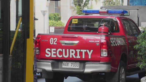 Manila / Philippines - 04 03 2020: A security vehicle in front of a Mall in Makati City, Manila