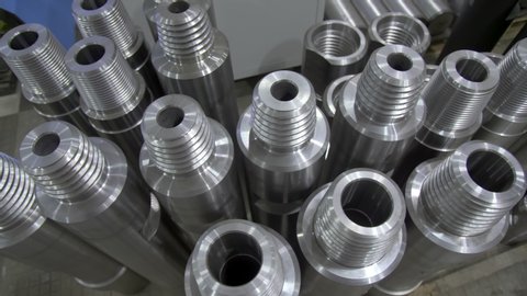 Metal parts are in warehouse after production. Threaded connection. Production of drilling rods. Mining