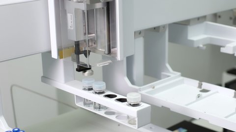Automatic system to clean the syringe by using solvent. Syringe moves to the solvent bottle and take the solvent to clean inside a syringe before move to take sample and inject into gas chromatography