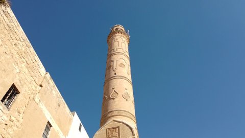 Mardin, Turkey - January 2020: Minaret of Ulu Cami, also known as Great mosque of Mardin