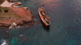 Aerial drone video of wrecked ship on Cyprus coast near Pegeia town
