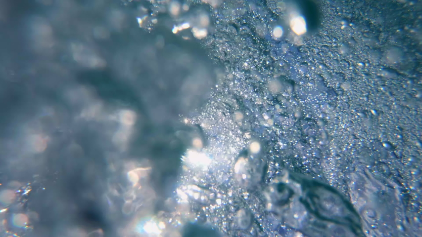 Underwater Bubbles  through water surface, natural slow motion underwater scene | Shutterstock HD Video #1051931377
