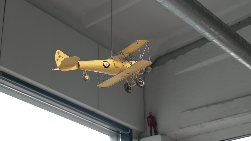 Plane in the office as a nice interior detail.