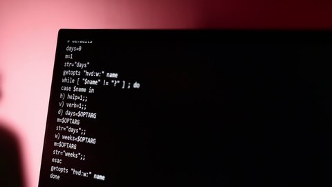 Running hacker like computer codes and information on digital screen

