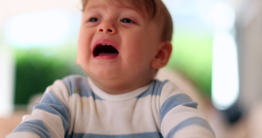 
Cute baby complaining crying out loud wanting attention. Toddler yelling opening mouth Royalty-Free Stock Footage #1051973737