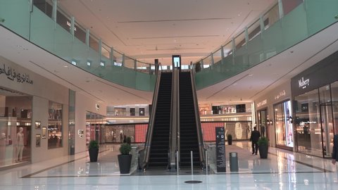 Dubai, UAE - May 2020: Dubai mall empty during COVID 19 pandemic lockdown with empty shops and no people; Dubai mall is one of the world's busiest malls and the largest mall in the world. 