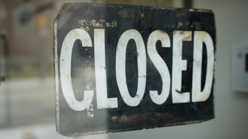 Small business opening up during pandemic. Turning the sign from close to open. Shot on RED camera in 4k. Royalty-Free Stock Footage #1051983598