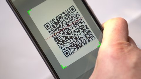 QR Code Scanning and reader app with smartphone. Using QR code for payment, commercial tracking, ticketing, product and loyalty marketing and in-store product labeling, exchanging information