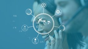 Animation of group of multi-ethnic call centre workers wearing headsets and using computers in office over globe spinning, social icons. Work communication technology concept digitally generated - Powered by Shutterstock - Get 15% off with code: PIKWIZARD15