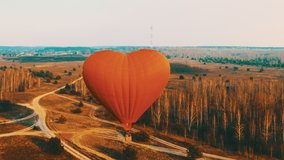 Aerial view of couple in ballon. High quality footage