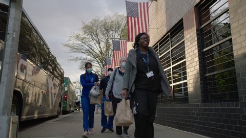 New York, NY / USA - April 2020: People Showing Support for Healthcare Workers Outside of Elmhurst Hospital During Coronavirus - Applauding, Thank You Messages, Signs