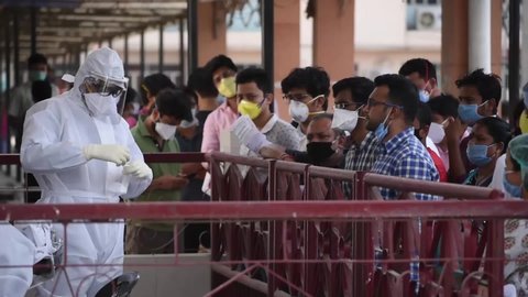 Guwahati, Assam, India. 8 May 2020. Medics collect swab samples of staff and students of Gauhati Medical College and Hospital for COVID-19 test after a PG student was tested positive for coronavirus.