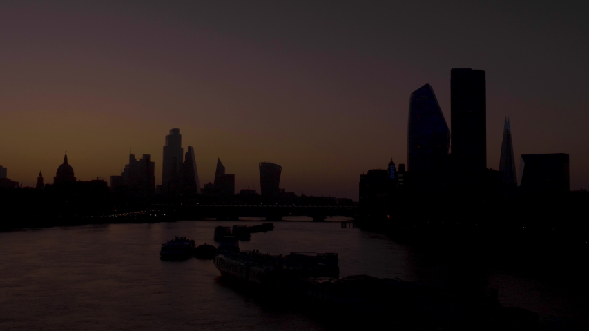 Beautiful Time-lapse of Sunrise from Waterloo Bridge of London Skyline. Royalty-Free Stock Footage #1052043457
