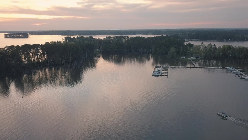 Following a pontoon boat into a marina on Lake Murray South Carolina