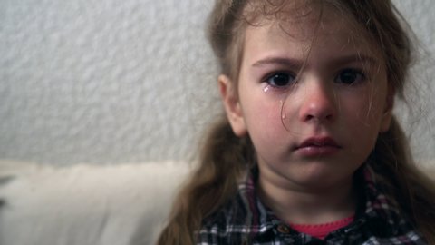 Little girl upset. Child abuse concept. Children and mental health awareness.