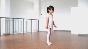Pretty asian young girl having her ballet practice through online class with her coach, online education and homeschooling concept stock video