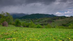 4k video of beautiful rural landscape with passing rain shower