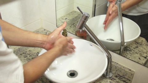 Washing hands with liquid soap.
Santos, Cidade/SP/Brasil - May, 9 2020.    