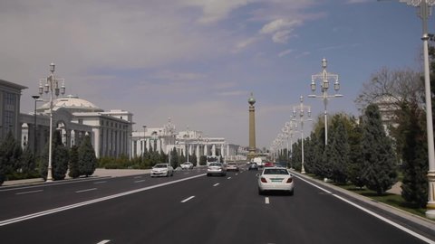 Turkmenistan Street, Cars Passing Along a Street in Ashgabat, Monument